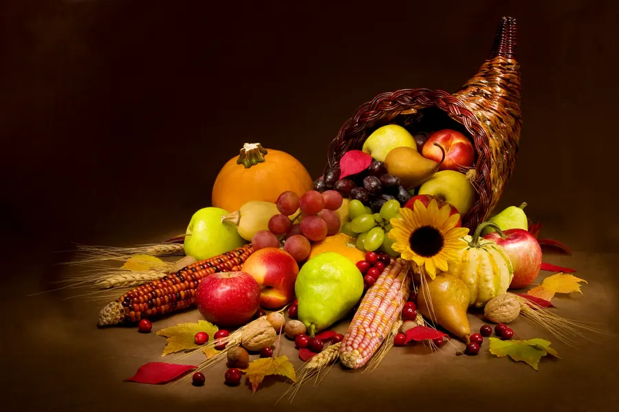A cornucopia overflowing with fresh fruit and vegetables